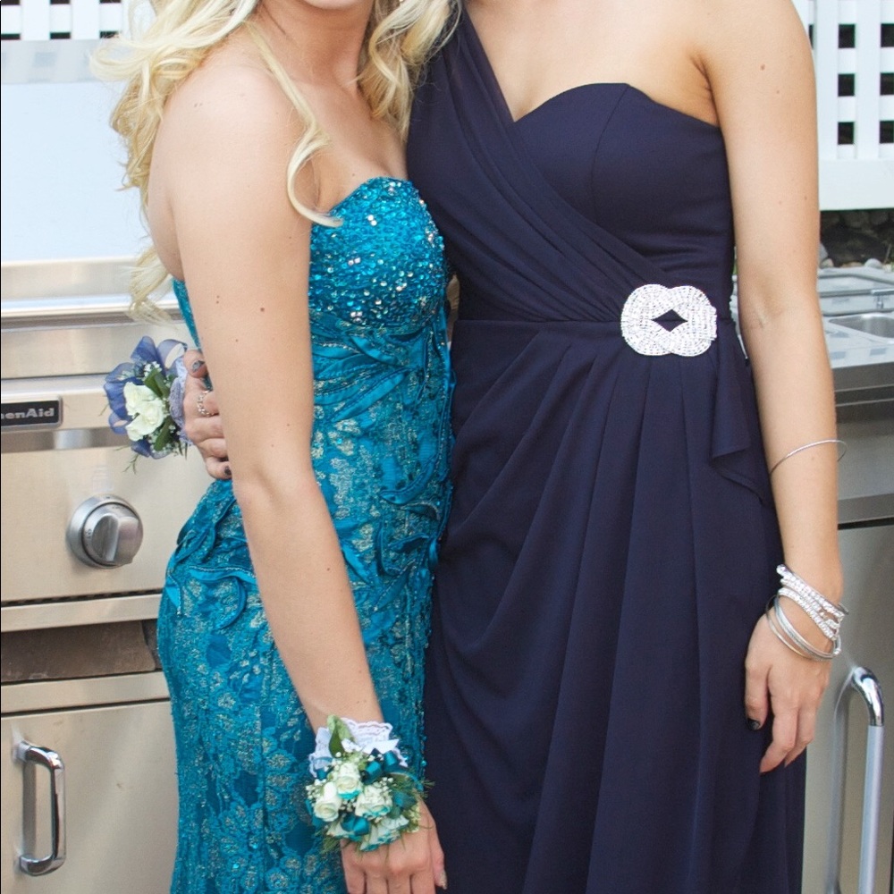 Navy draped formal prom gown with silver detail